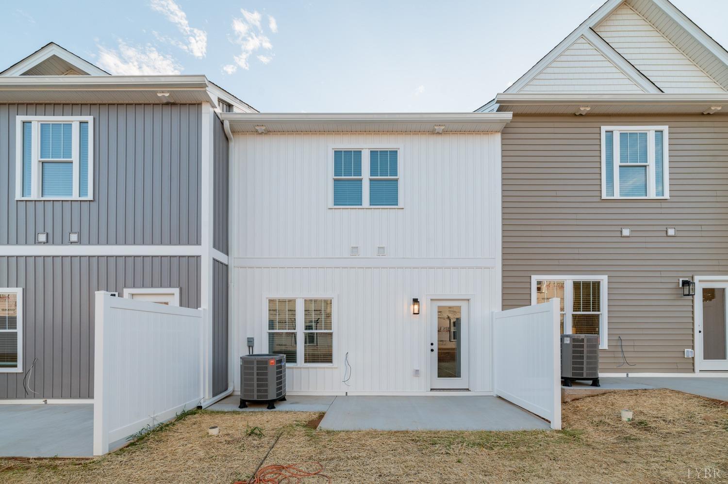 556 Leesville Road, Unit 905 Lynchburg, VA 24502 - Photo 6 of 40 a front view of a house with large windows