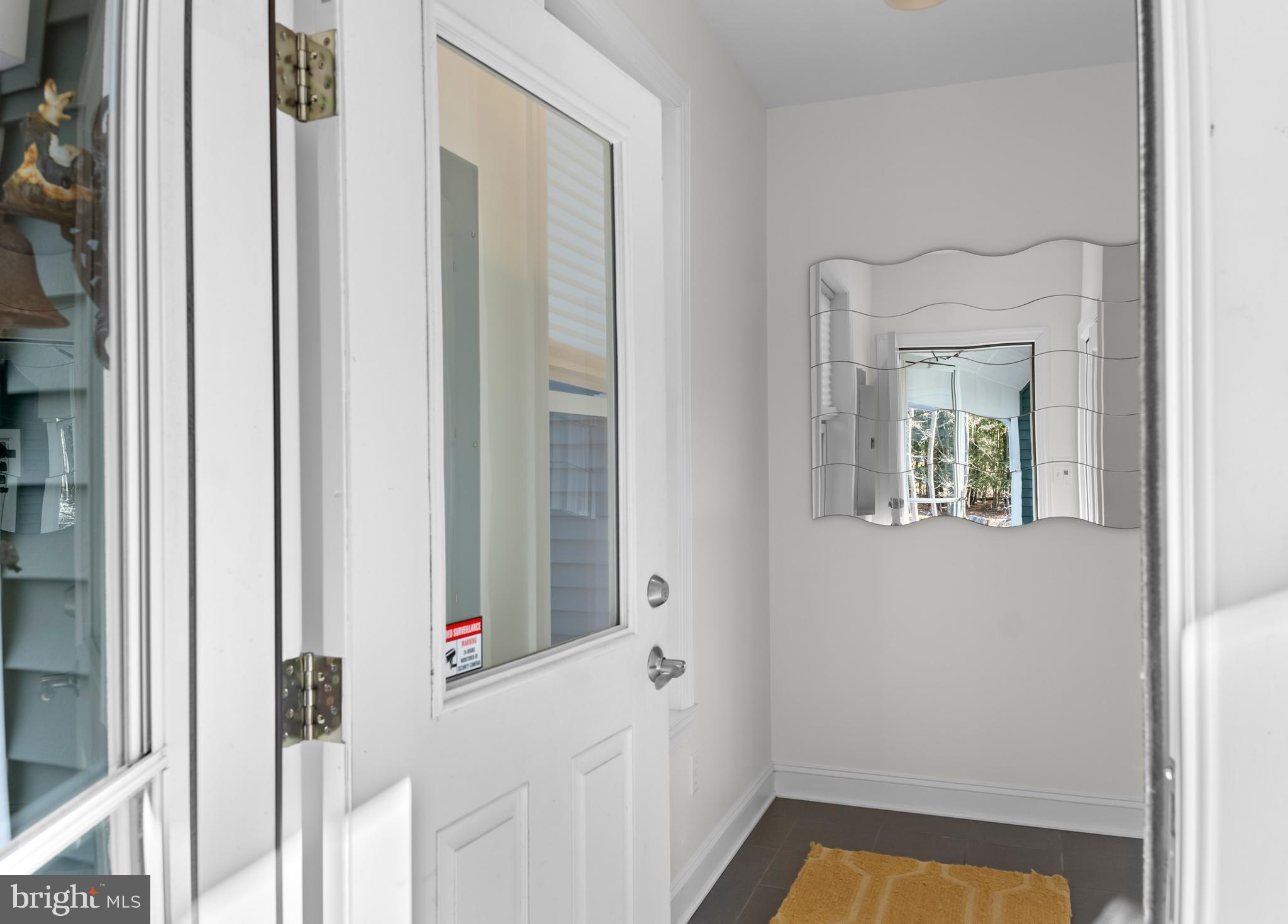 34506 Doe Run Lewes, DE 19958 - Photo 34 of 54 Mudroom to Breezeway / Garage