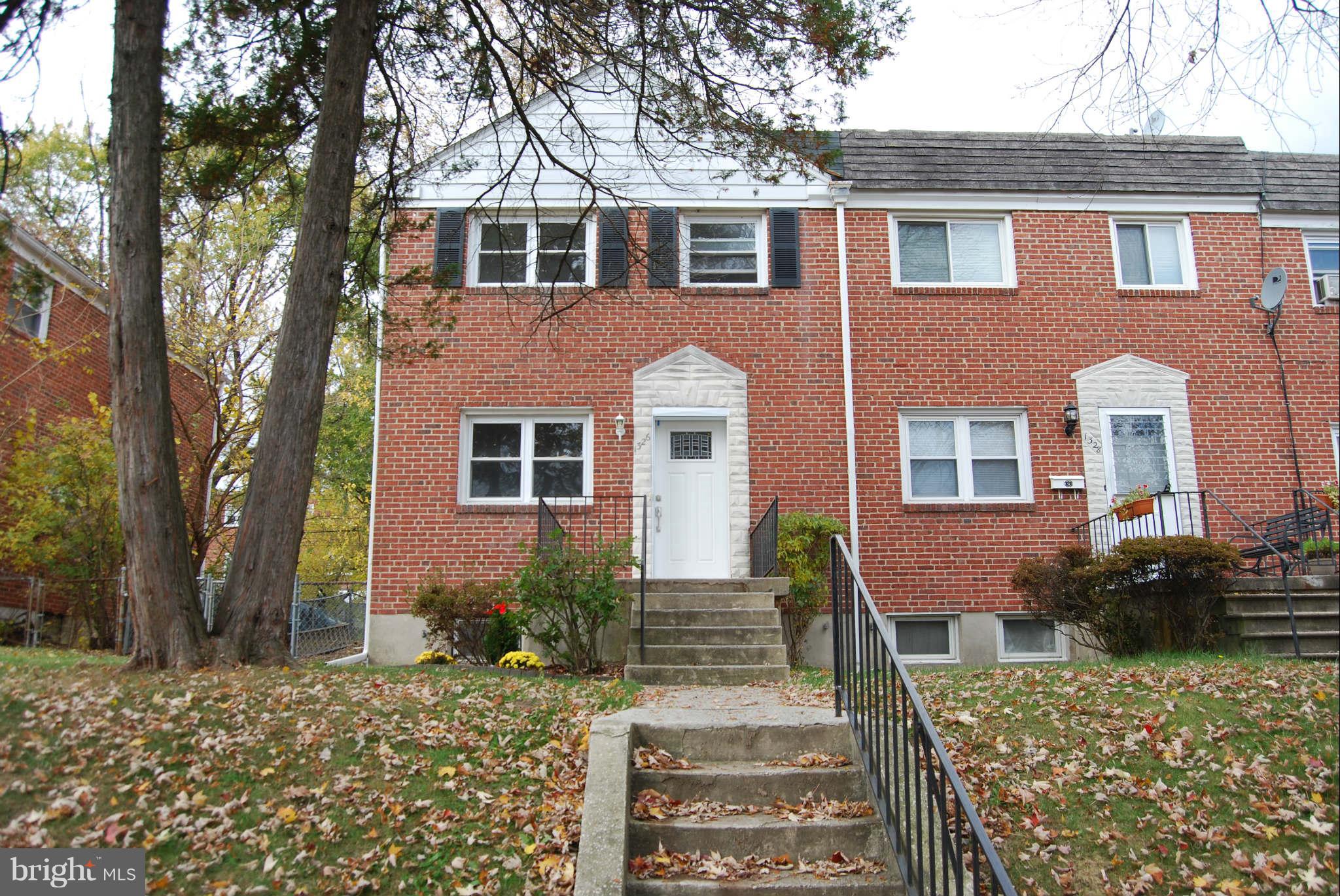 1326 Halstead Road Parkville, MD 21234 - Photo 1 of 30 a front view of a house with garden
