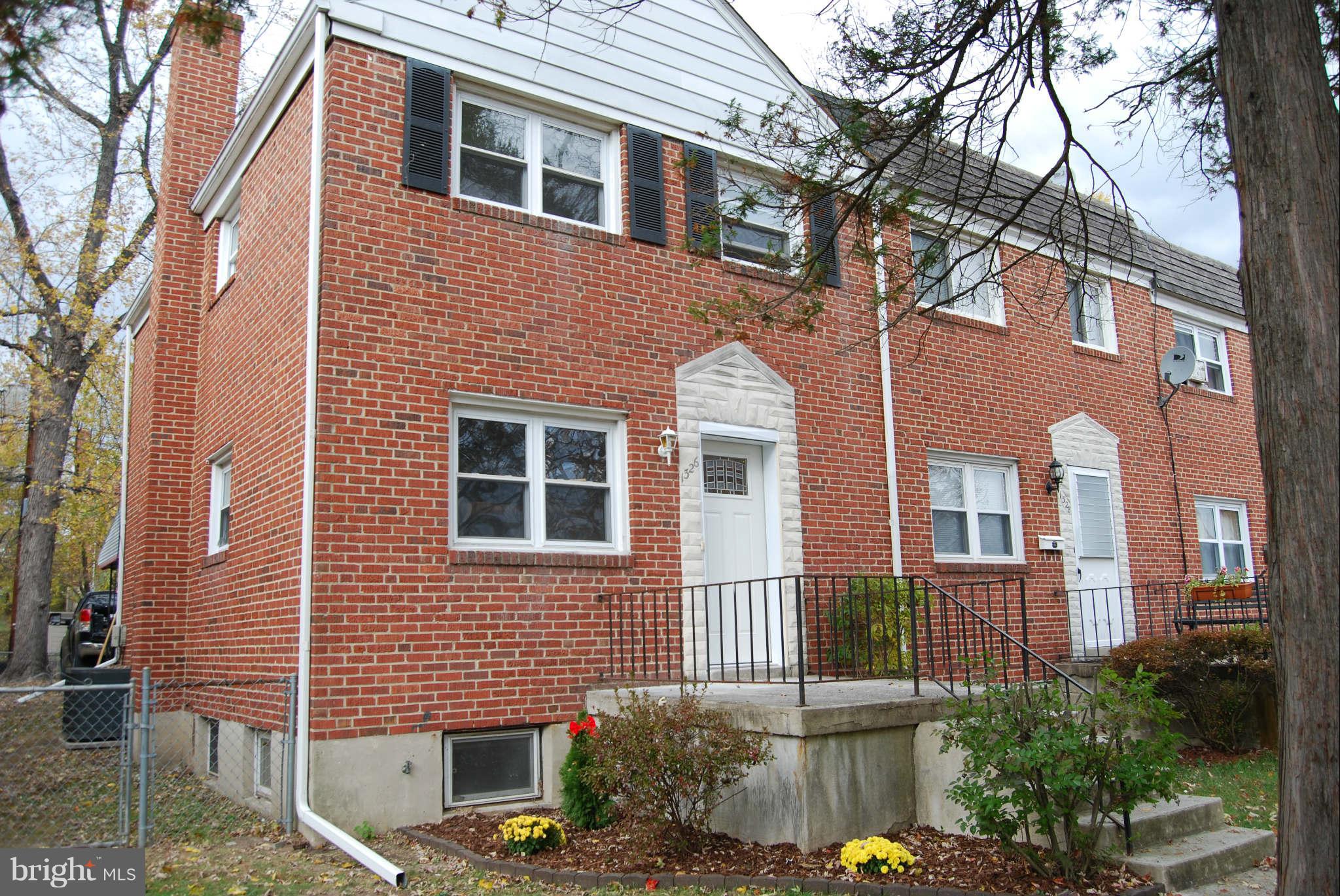 1326 Halstead Road Parkville, MD 21234 - Photo 3 of 30 a front view of a house with large windows