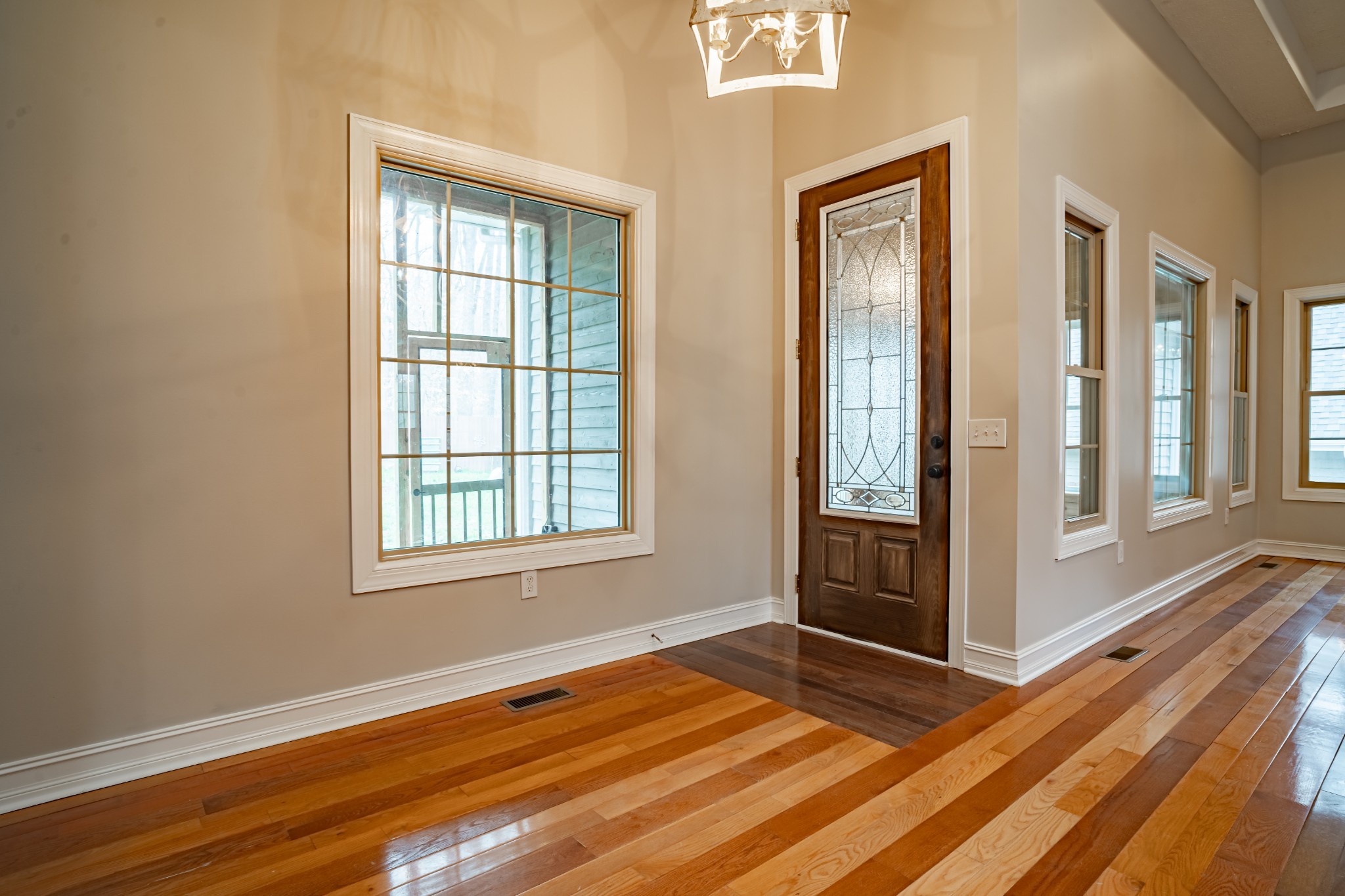 550 Laurel Crown Road Manchester, TN 37355 - Photo 51 of 87 a view of an empty room with wooden floor and a window