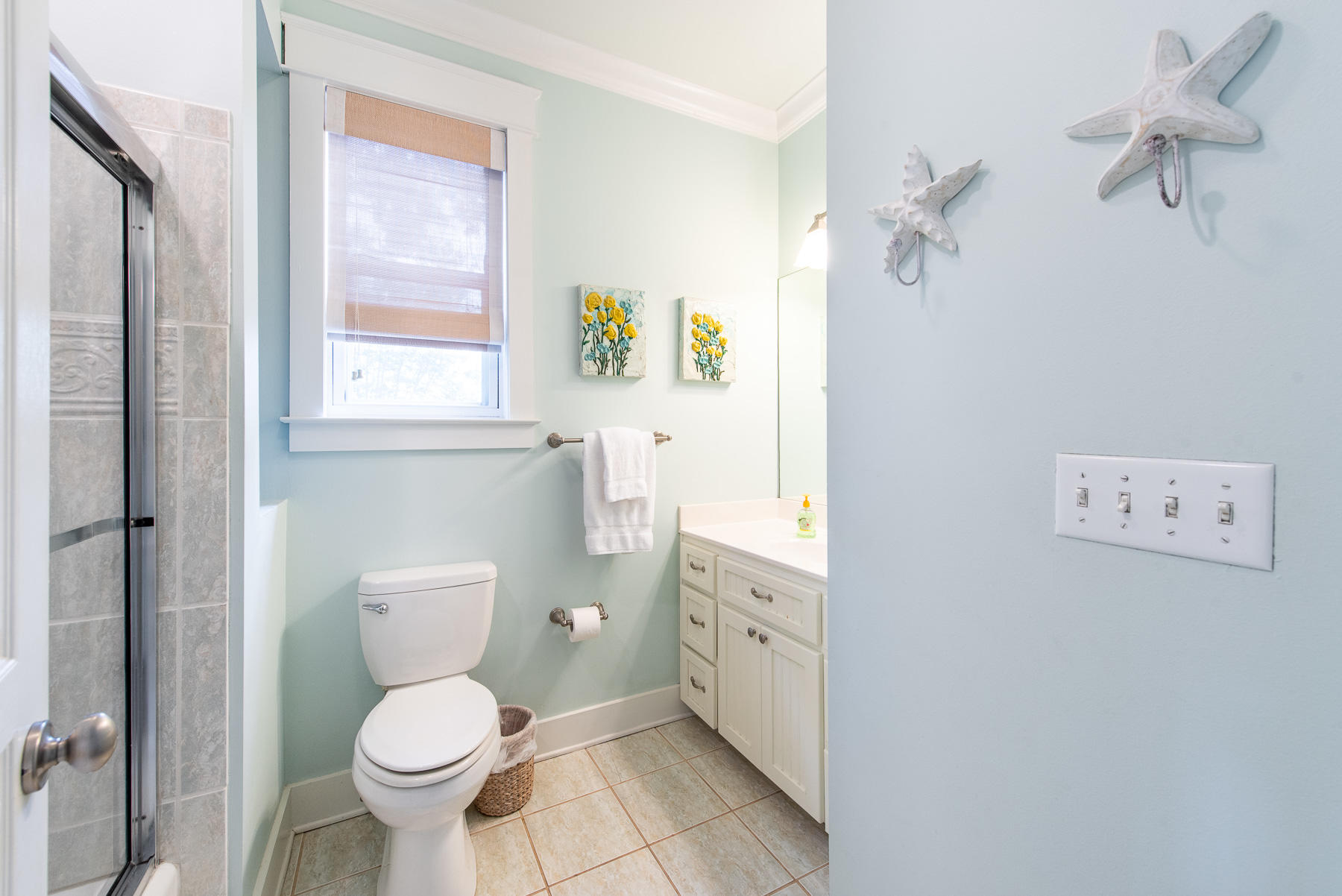 107 East Cobia Run Inlet Beach Inlet Beach, FL 32461 - Photo 11 of 33 a bathroom with a toilet sink and mirror