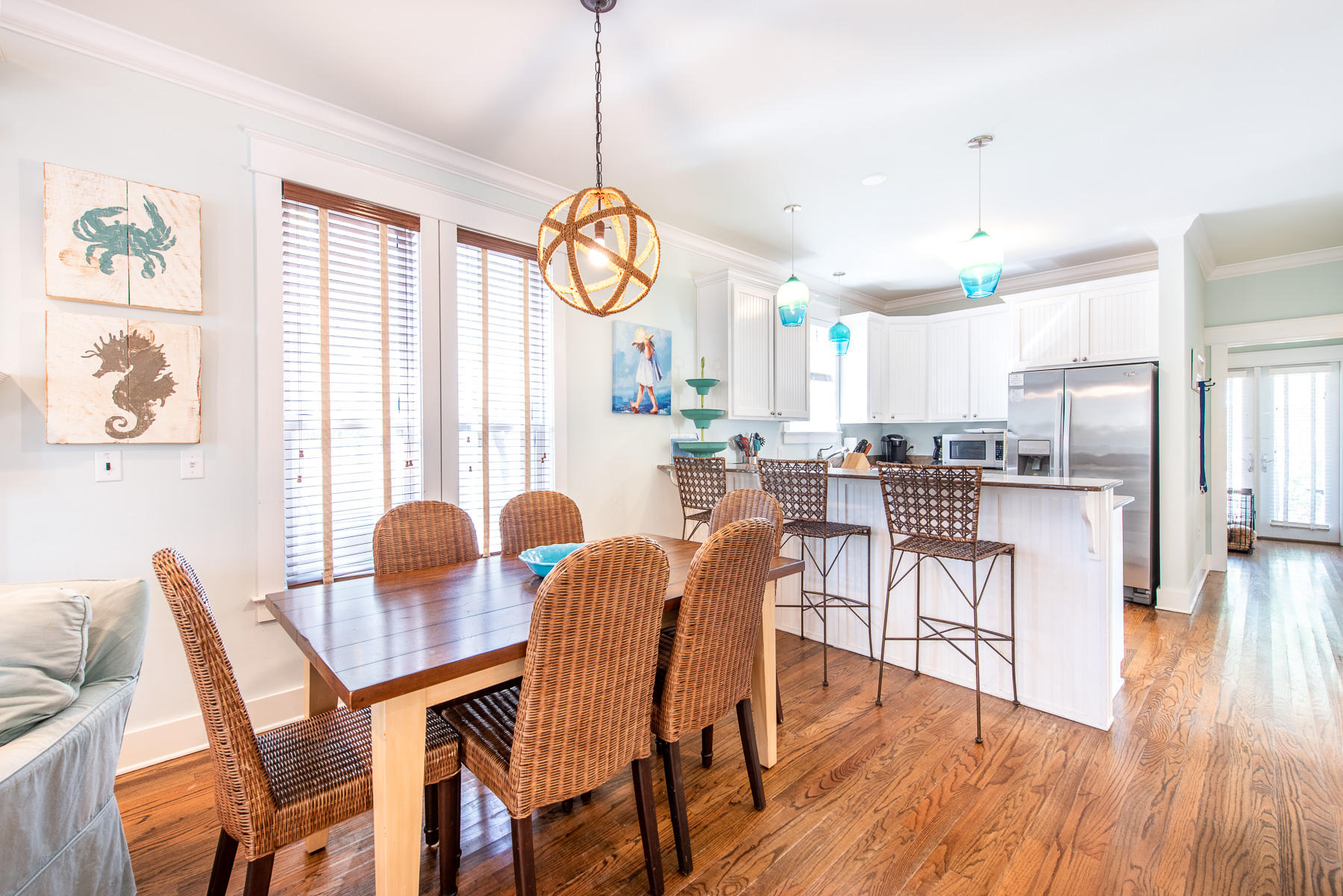 107 East Cobia Run Inlet Beach Inlet Beach, FL 32461 - Photo 6 of 33 a view of a dining room and livingroom with furniture wooden floor a chandelier