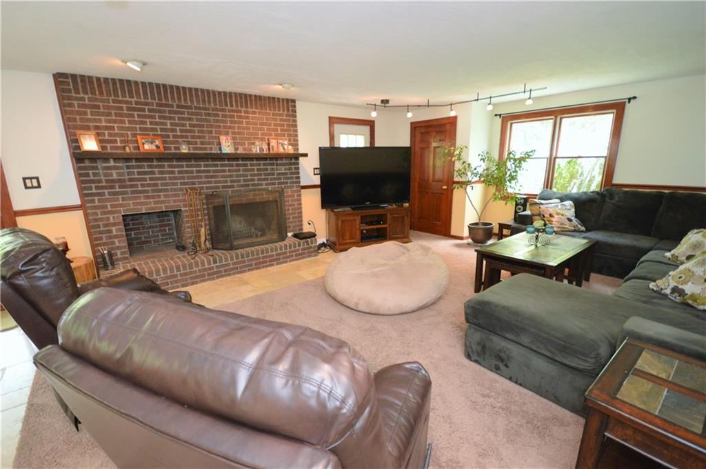 285 Ridge Road Valencia, PA 16059 - Photo 10 of 25 Family room by Kitchen area with wood burning fireplace open floor plan