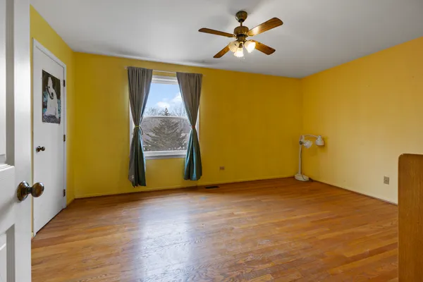 a view of a hallway with a large window