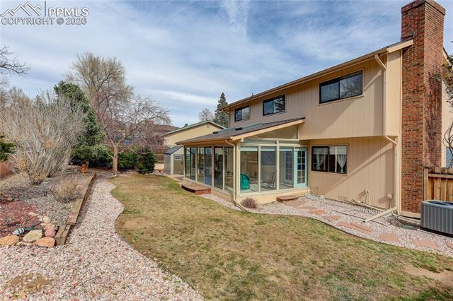 699 Gilcrest Road Colorado Springs, CO 80906 - Photo 29 of 37 Fully landscaped and fenced backyard