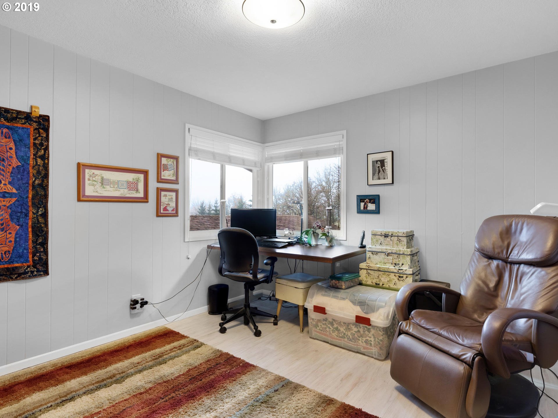 21390 Southwest Farmington Road Beaverton, OR 97007 - Photo 11 of 25 a living room with furniture and a piano