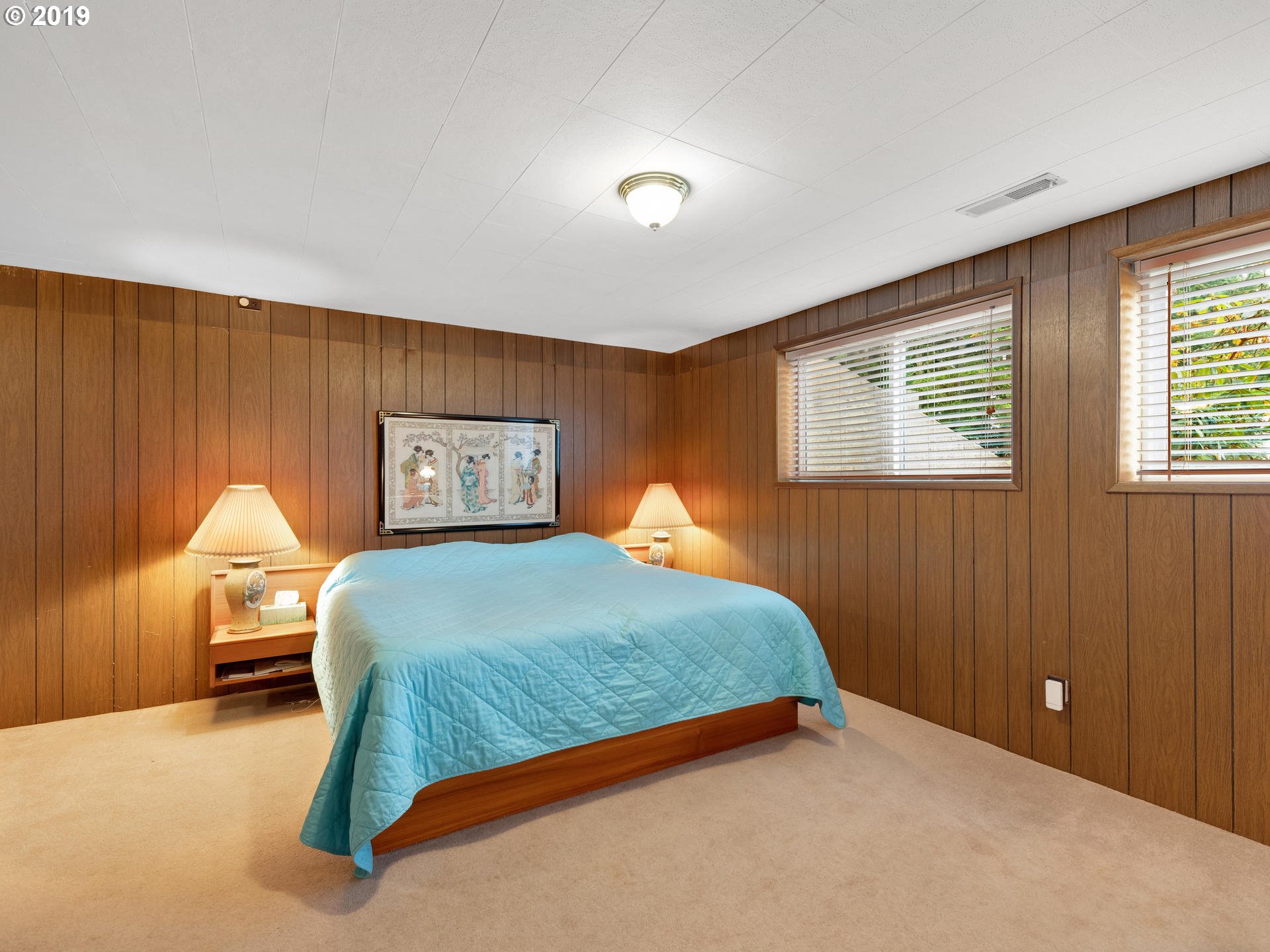 21390 Southwest Farmington Road Beaverton, OR 97007 - Photo 14 of 25 a bedroom with a bed and window
