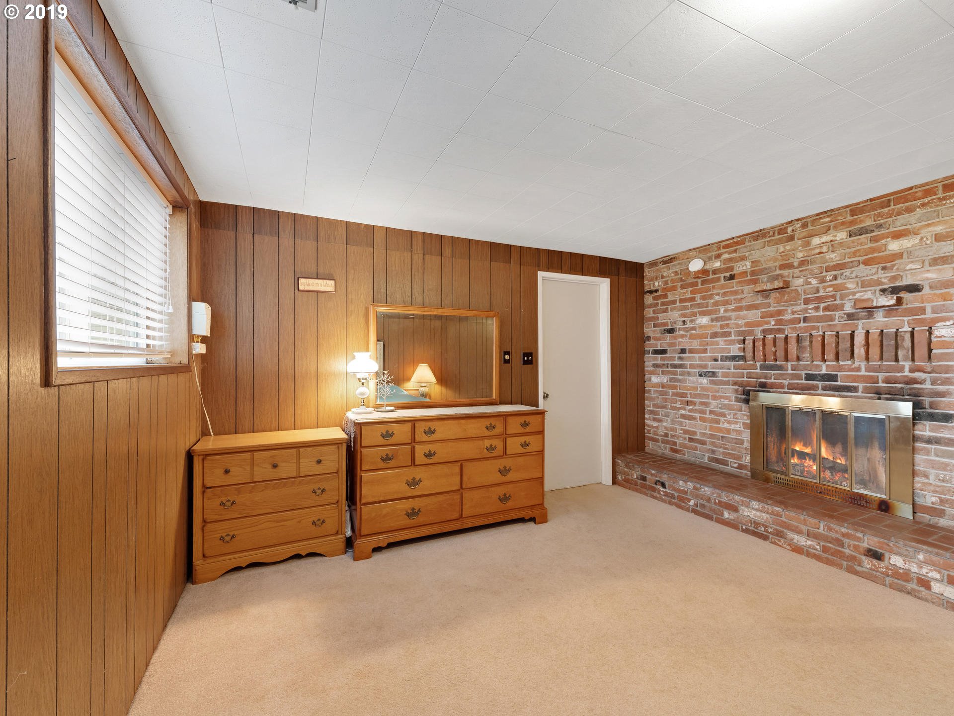 21390 Southwest Farmington Road Beaverton, OR 97007 - Photo 15 of 25 a room with furniture and a dresser