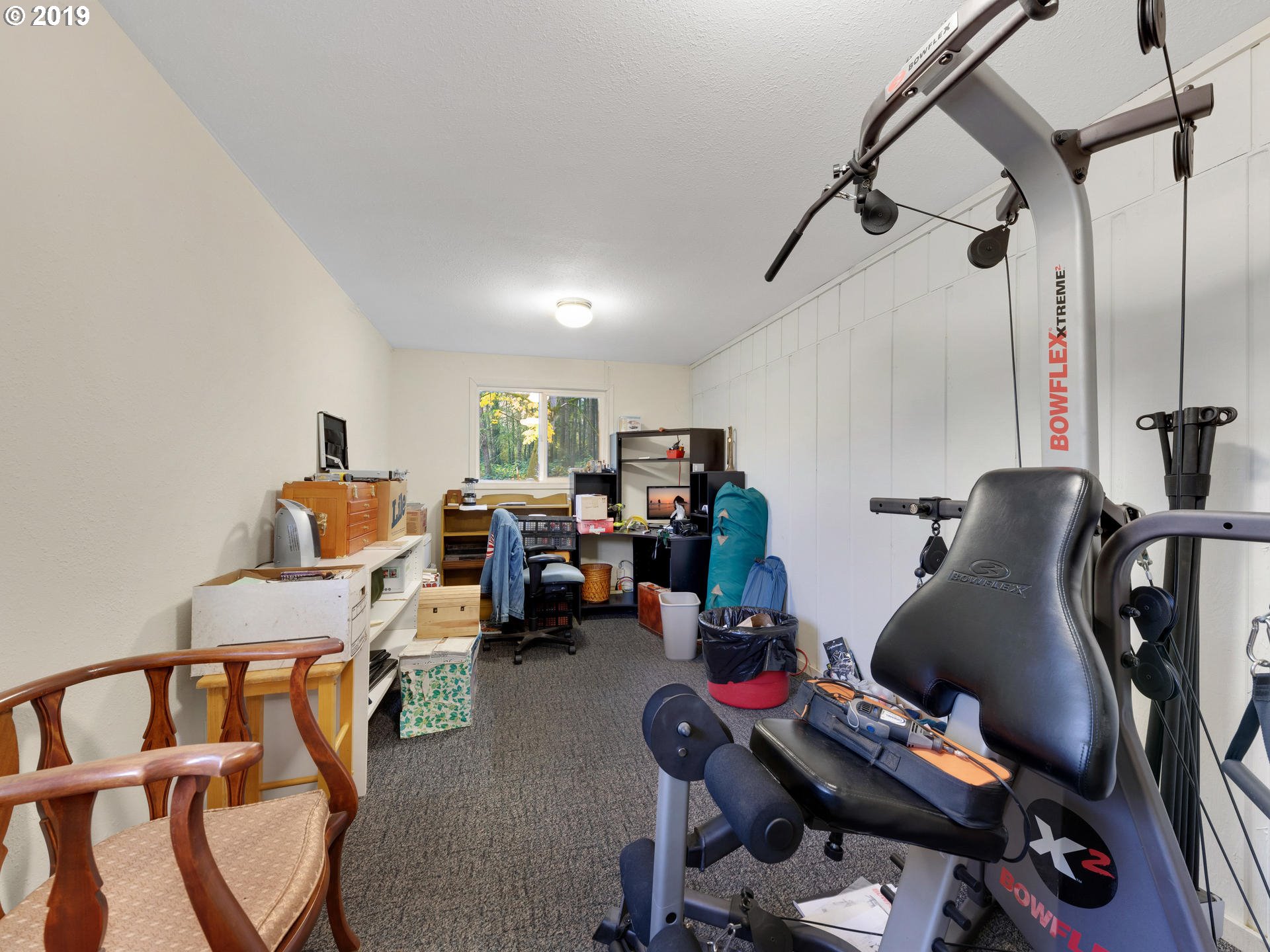 21390 Southwest Farmington Road Beaverton, OR 97007 - Photo 19 of 25 a room with furniture a air conditioner and a window