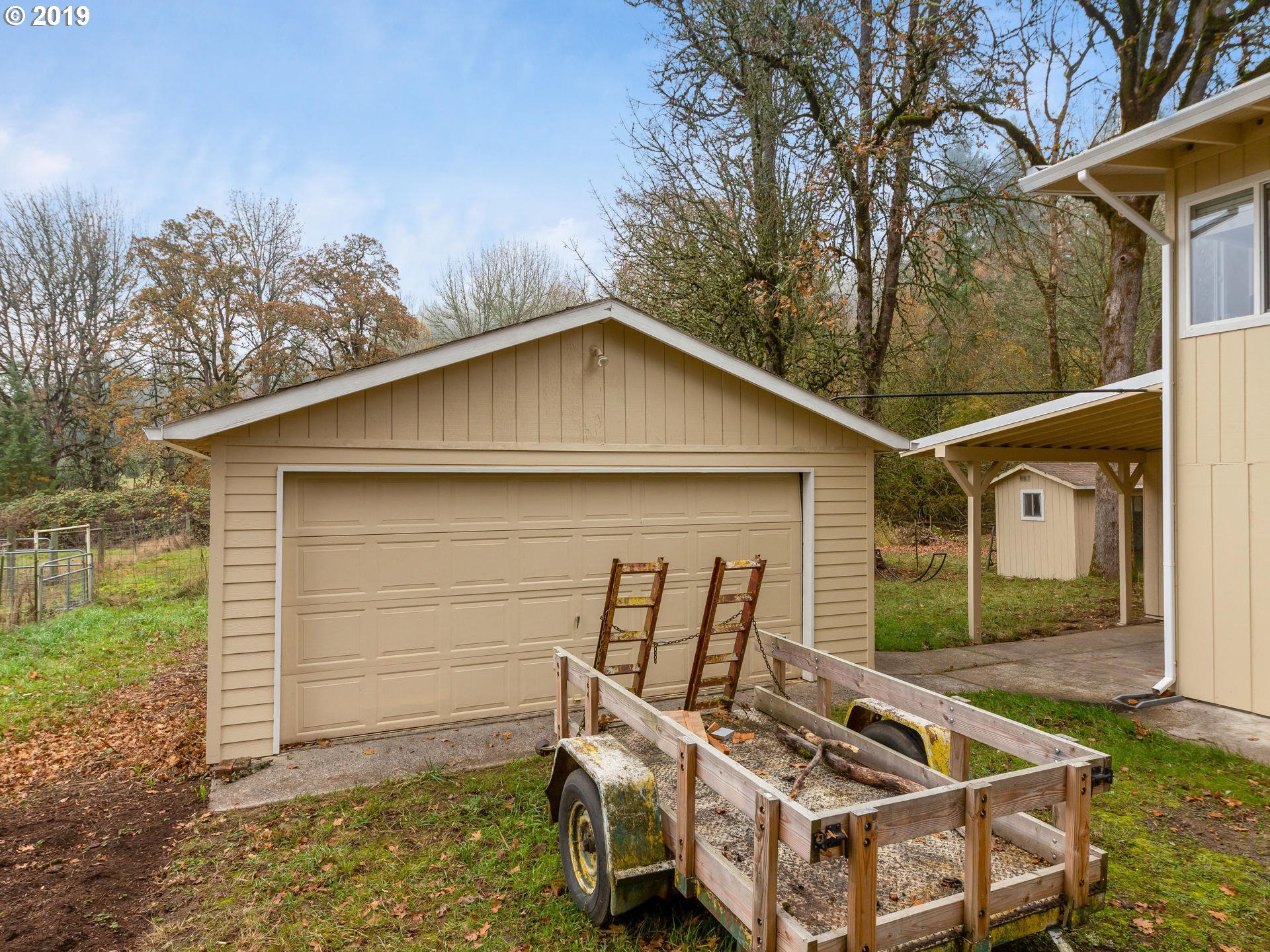 21390 Southwest Farmington Road Beaverton, OR 97007 - Photo 3 of 25 a view of a house with a yard