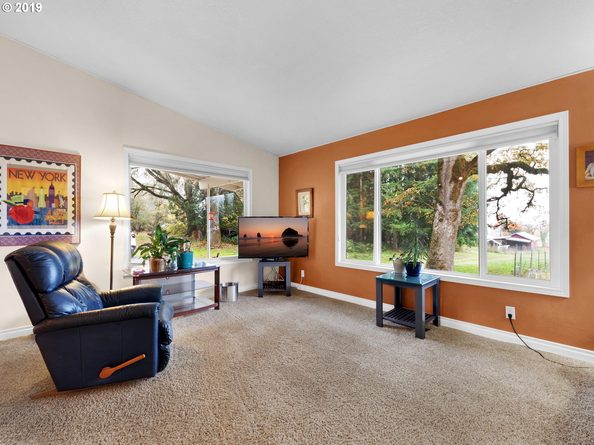 21390 Southwest Farmington Road Beaverton, OR 97007 - Photo 5 of 25 a living room with furniture and a large window