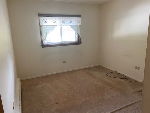 239 Northway Park Road Machesney Park, IL 61115 - Photo 11 of 14 an empty room with a window