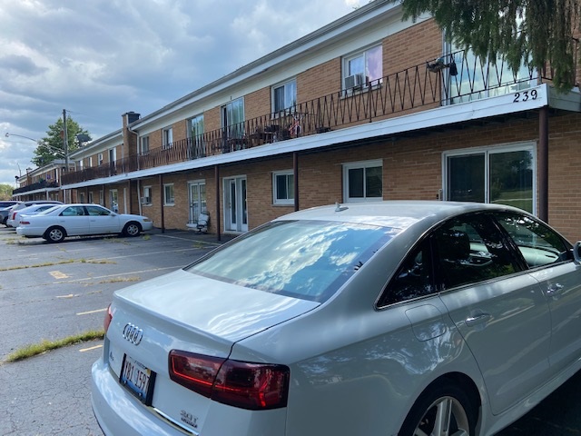 239 Northway Park Road Machesney Park, IL 61115 - Photo 13 of 14 a car parked in front of a house
