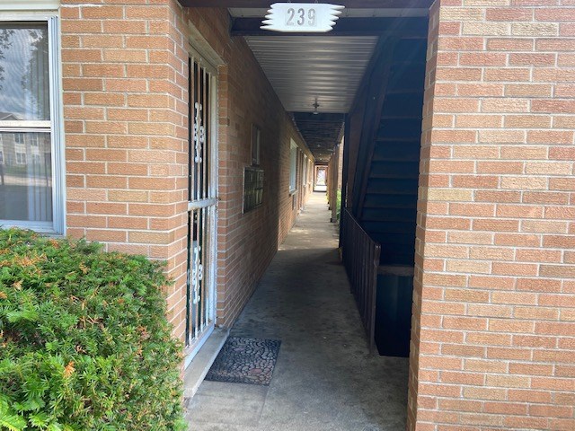 239 Northway Park Road Machesney Park, IL 61115 - Photo 4 of 14 a view of a pathway along the house