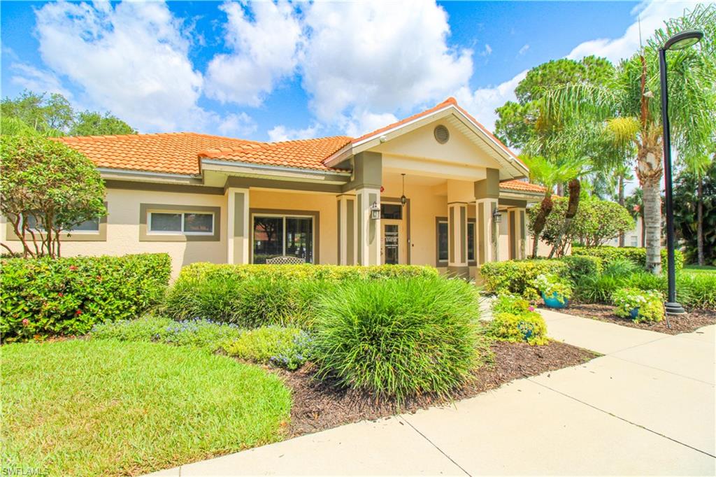 225 Robin Hood Circle, Unit 203 Naples, FL 34104 - Photo 47 of 50 View of front of house