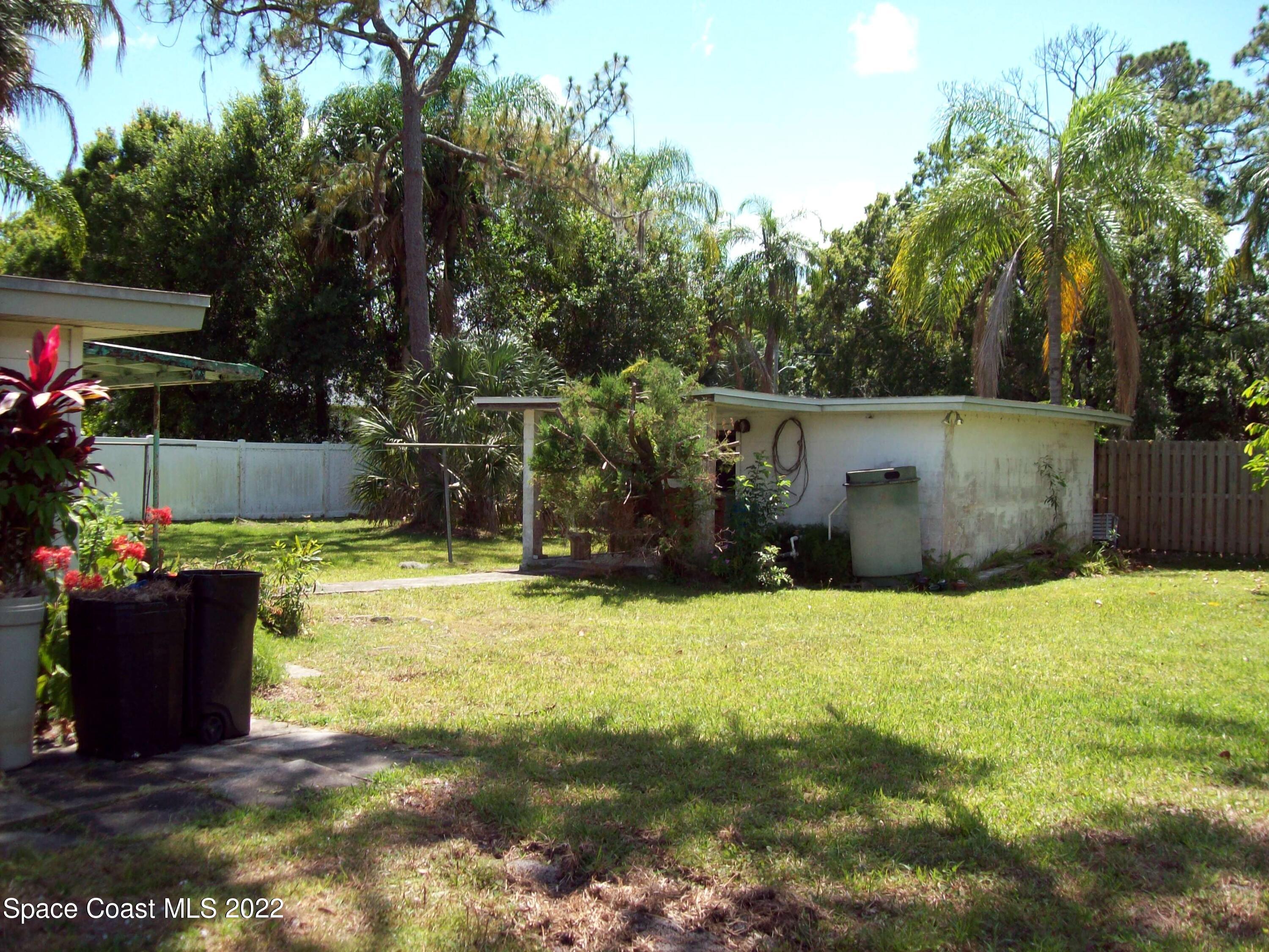 2224 Iowa Street Melbourne, FL 32904 - Photo 7 of 19 a view of a backyard