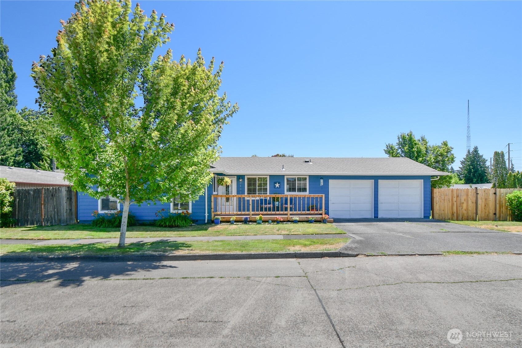2102 35th Avenue Longview, WA 98632 - Photo 31 of 31 a view of a house with a yard and large trees