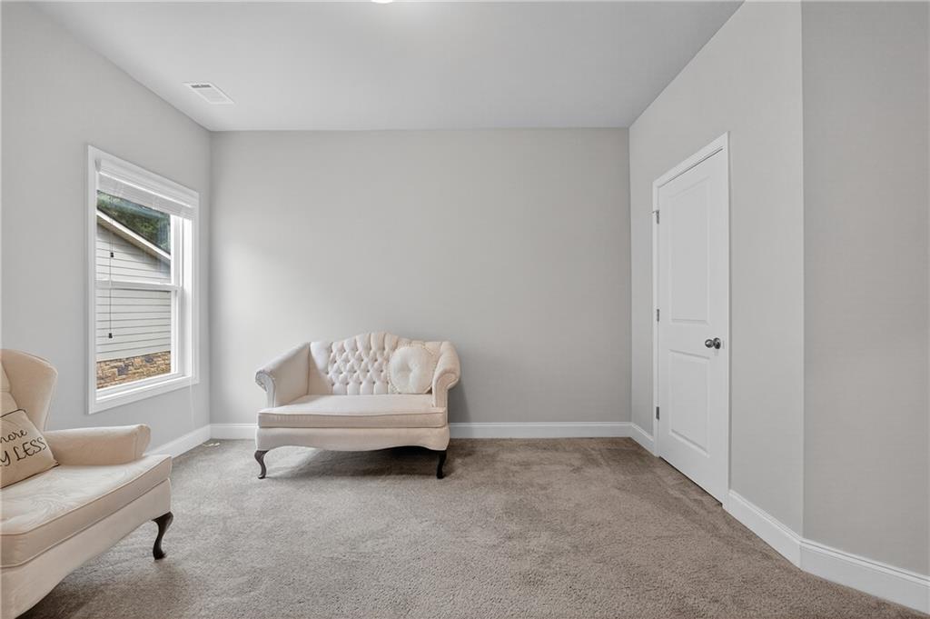 8325 Loch Lomand Lane Winston, GA 30187 - Photo 11 of 31 a living room with furniture and a window