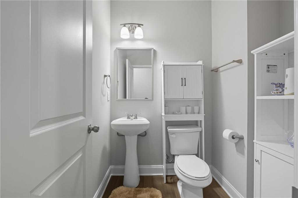 8325 Loch Lomand Lane Winston, GA 30187 - Photo 13 of 31 a bathroom with a sink a toilet and shower