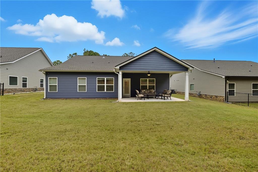 8325 Loch Lomand Lane Winston, GA 30187 - Photo 2 of 31 a front view of a house with a garden
