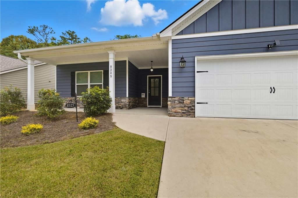 8325 Loch Lomand Lane Winston, GA 30187 - Photo 4 of 31 front view of a house with potted plants
