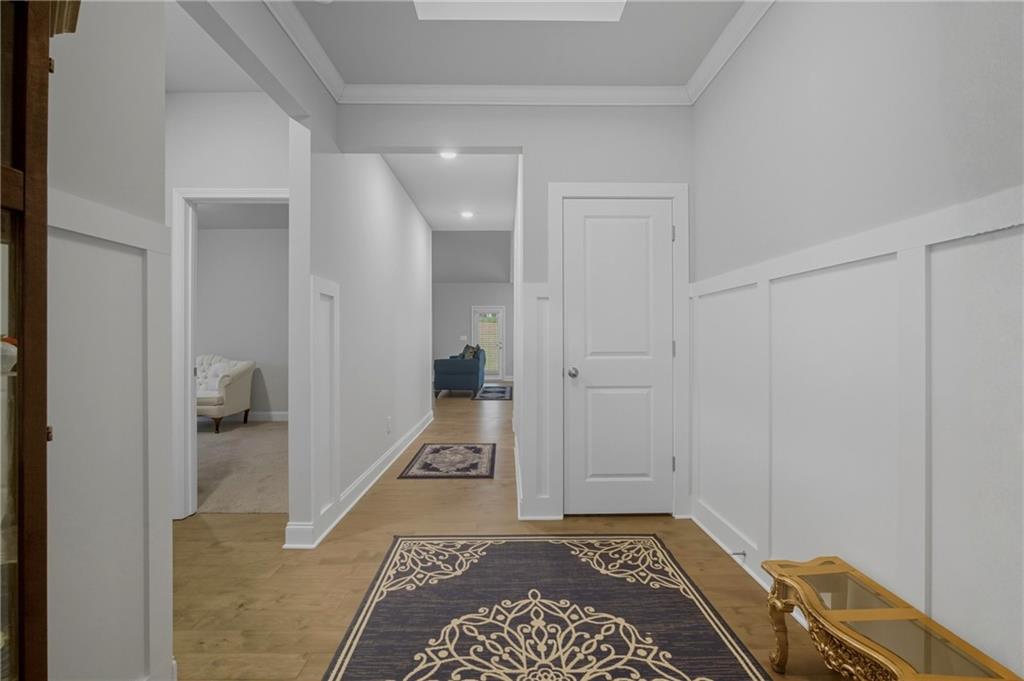 8325 Loch Lomand Lane Winston, GA 30187 - Photo 5 of 31 a view of a hallway with a rug and a bathroom