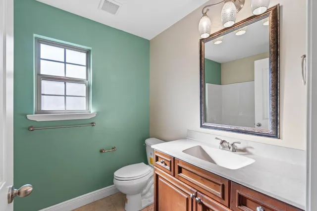 a bathroom with a sink and a toilet