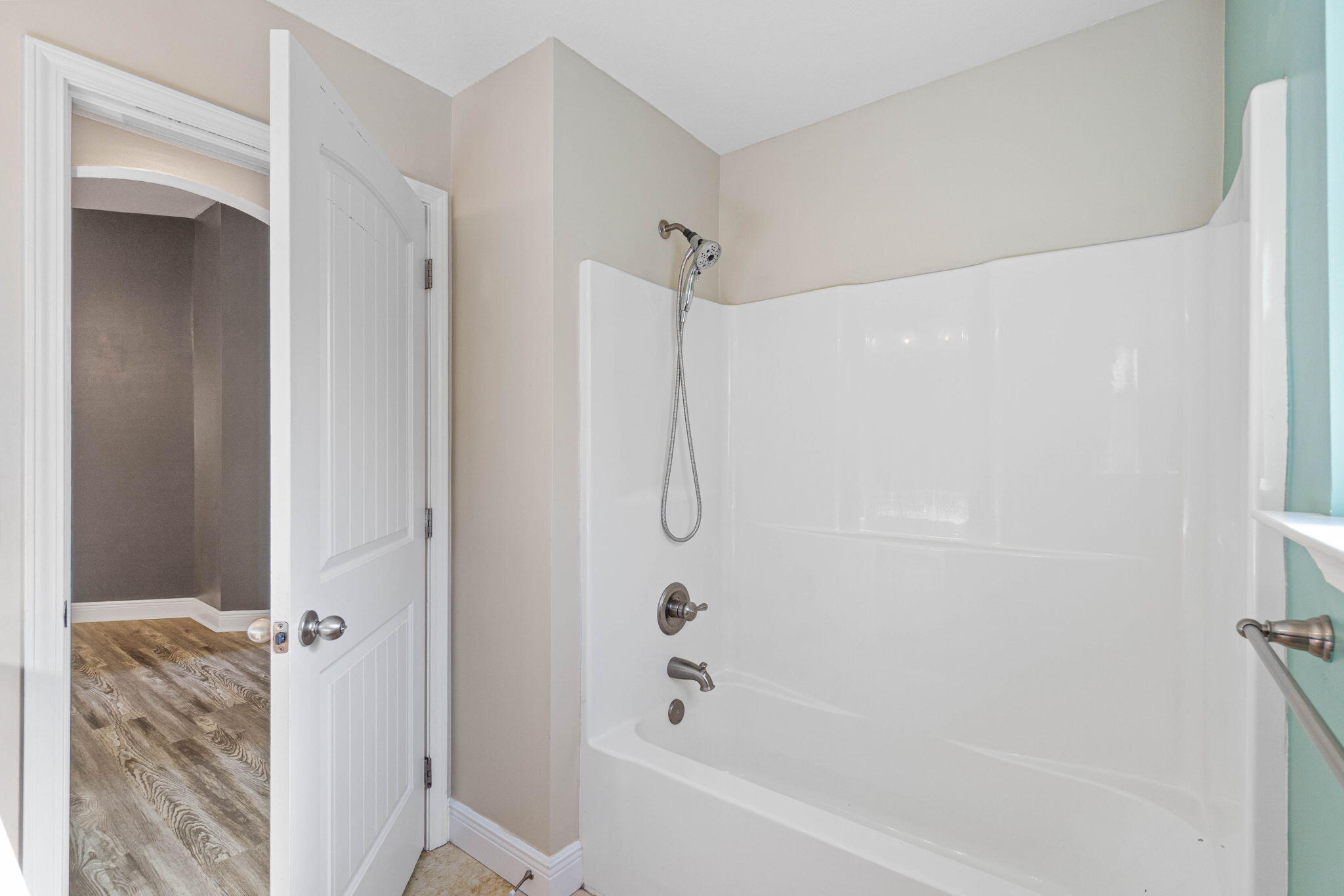 227 January Court Crestview, FL 32539 - Photo 16 of 25 a bathroom with a glass shower door