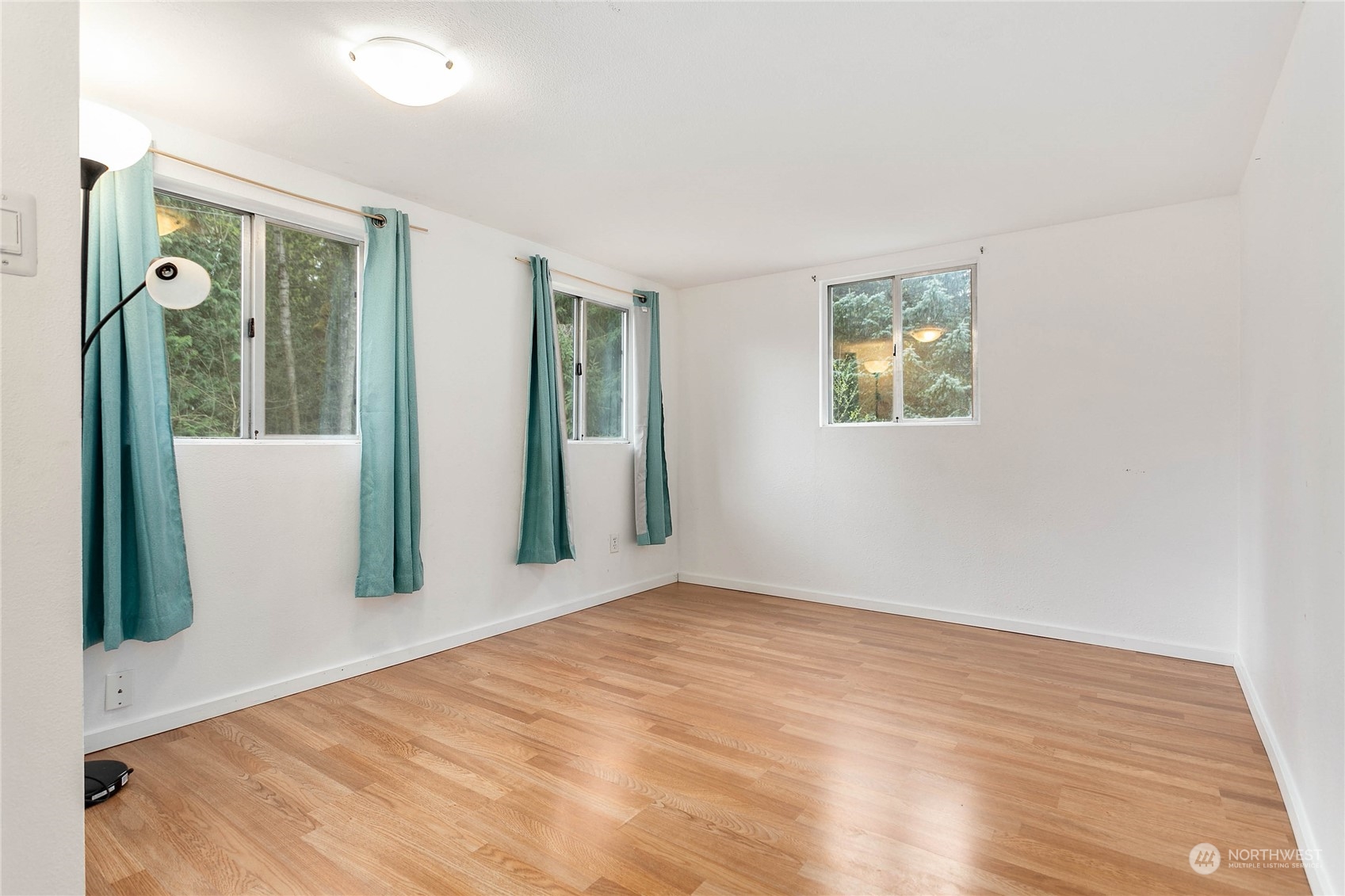 6040 Reese Hill Road Sumas, WA 98295 - Photo 23 of 34 a view of a room with wooden floor and a window