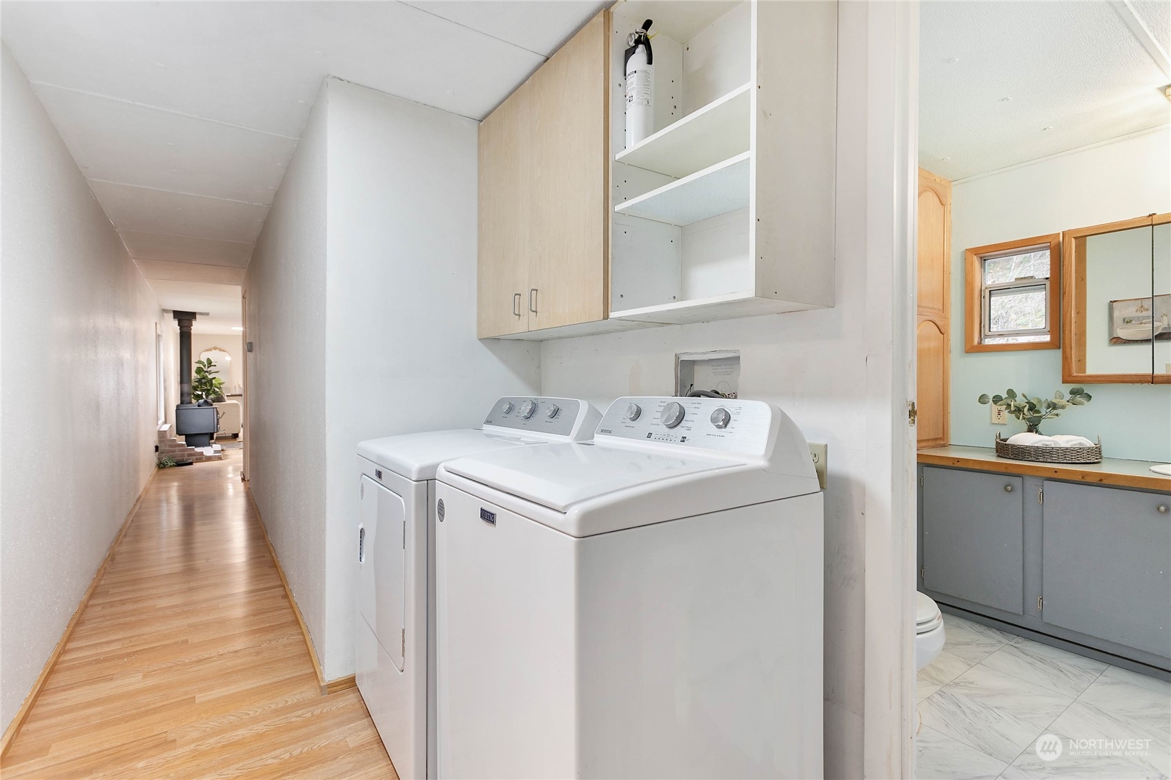 6040 Reese Hill Road Sumas, WA 98295 - Photo 26 of 34 a utility room with cabinets washer and dryer
