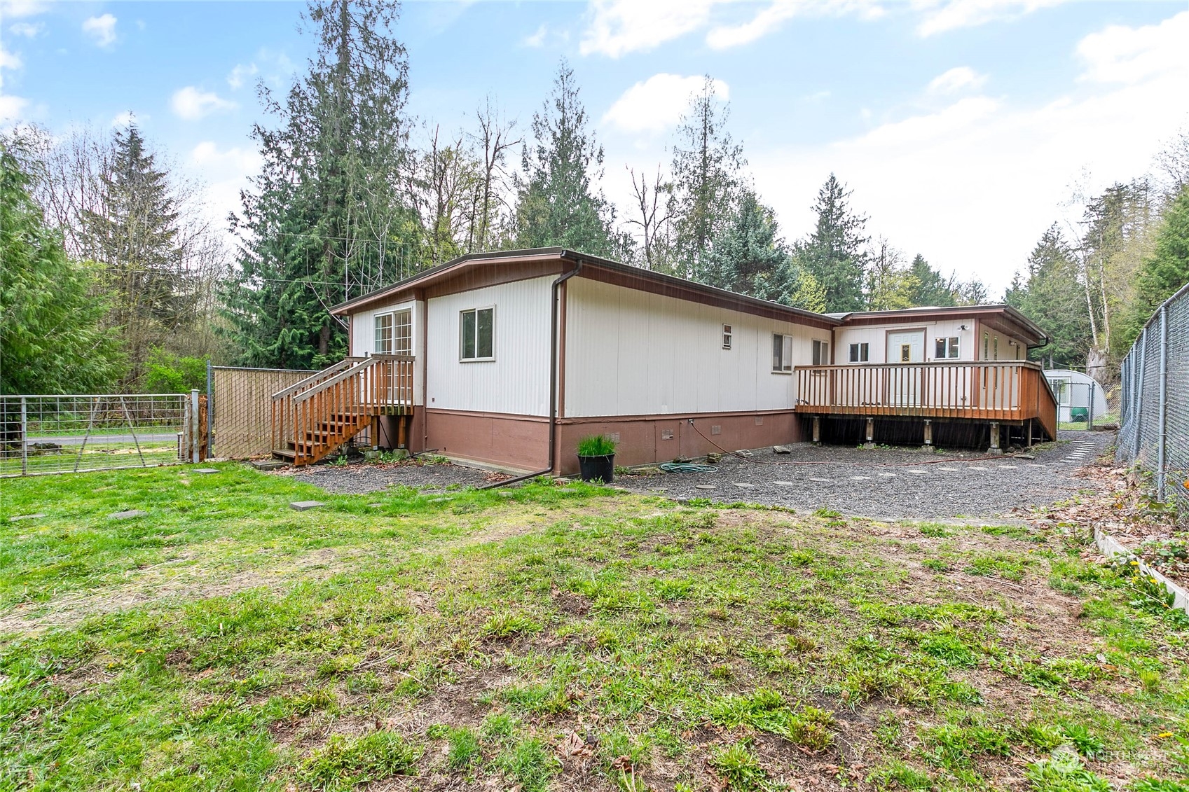 6040 Reese Hill Road Sumas, WA 98295 - Photo 3 of 34 a view of a house with backyard and sitting area