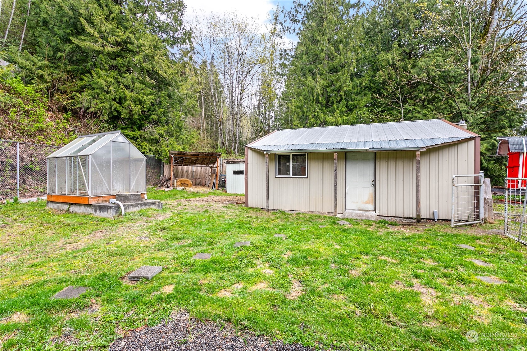 6040 Reese Hill Road Sumas, WA 98295 - Photo 34 of 34 a view of a house with backyard and a tree