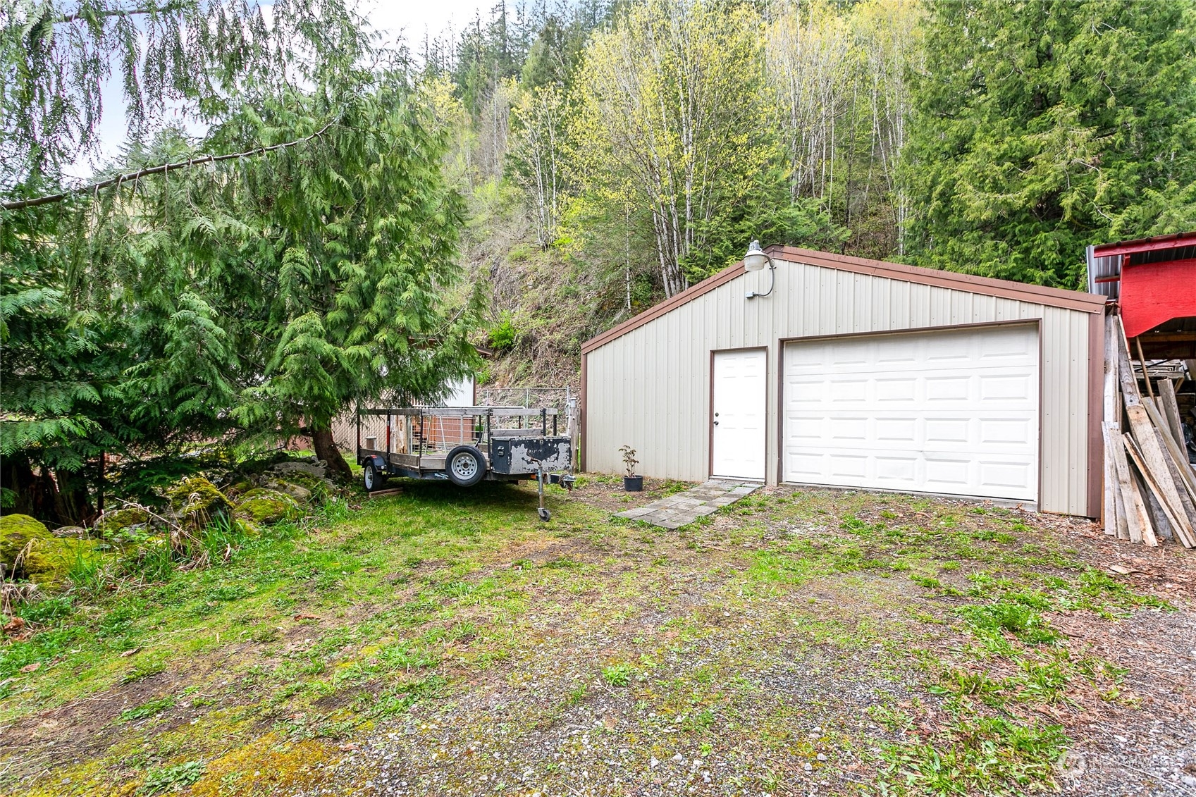 6040 Reese Hill Road Sumas, WA 98295 - Photo 4 of 34 a house with trees in front of it