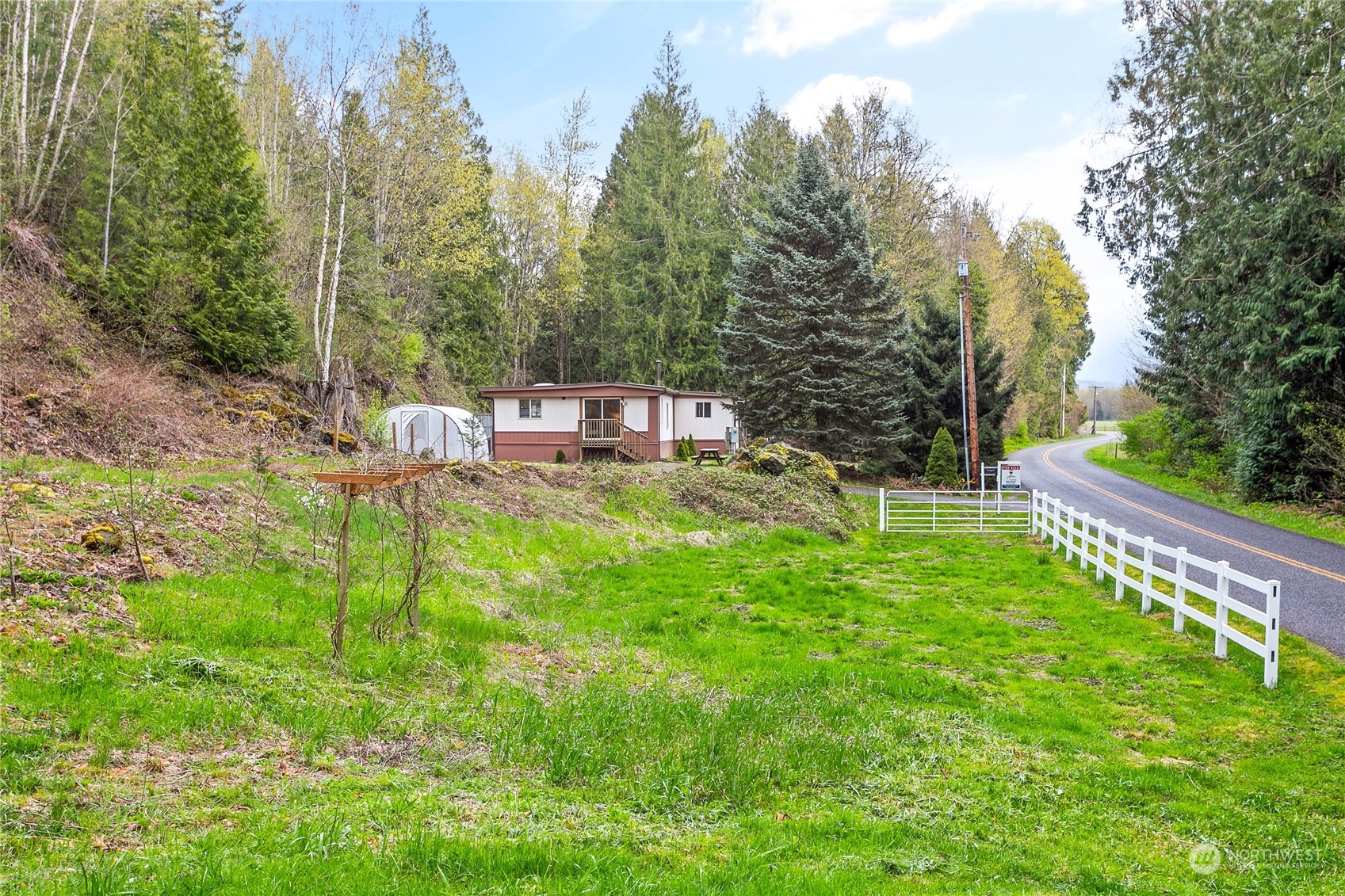 6040 Reese Hill Road Sumas, WA 98295 - Photo 5 of 34 a view of a chair and tables in the garden