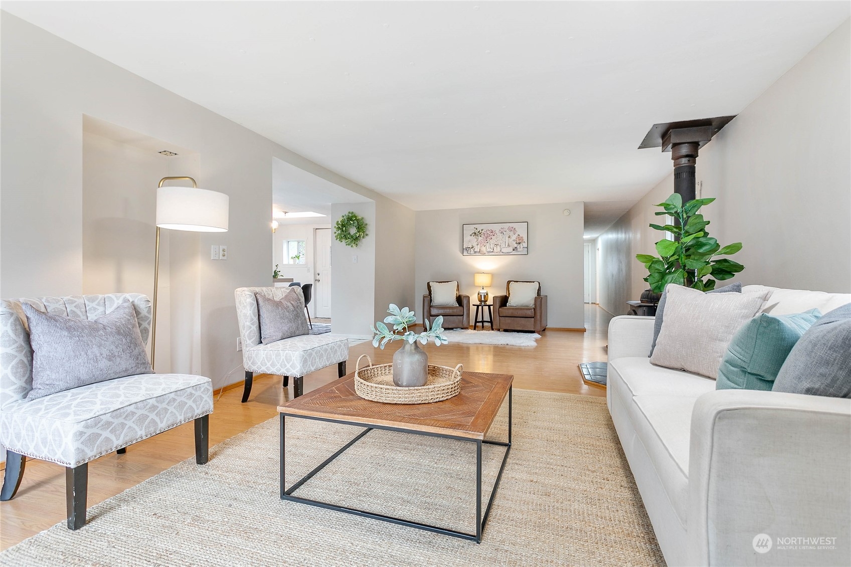 6040 Reese Hill Road Sumas, WA 98295 - Photo 7 of 34 a living room with furniture and a potted plant