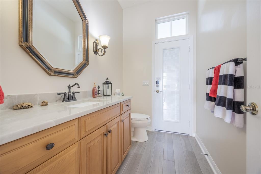 7146 Southwest 35th Avenue Gainesville, FL 32608 - Photo 25 of 83 a bathroom with a sink and a mirror
