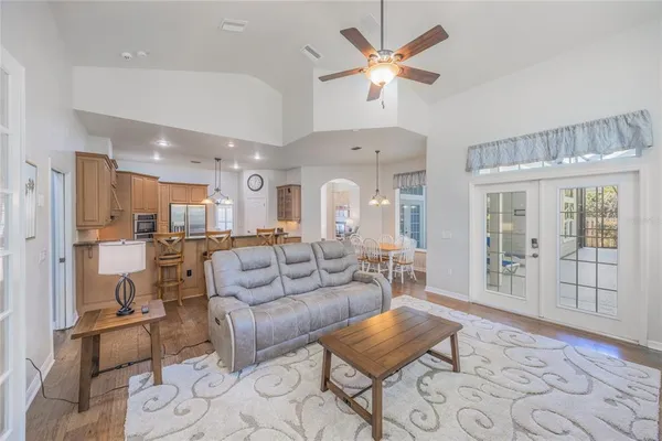 a living room with furniture and a window
