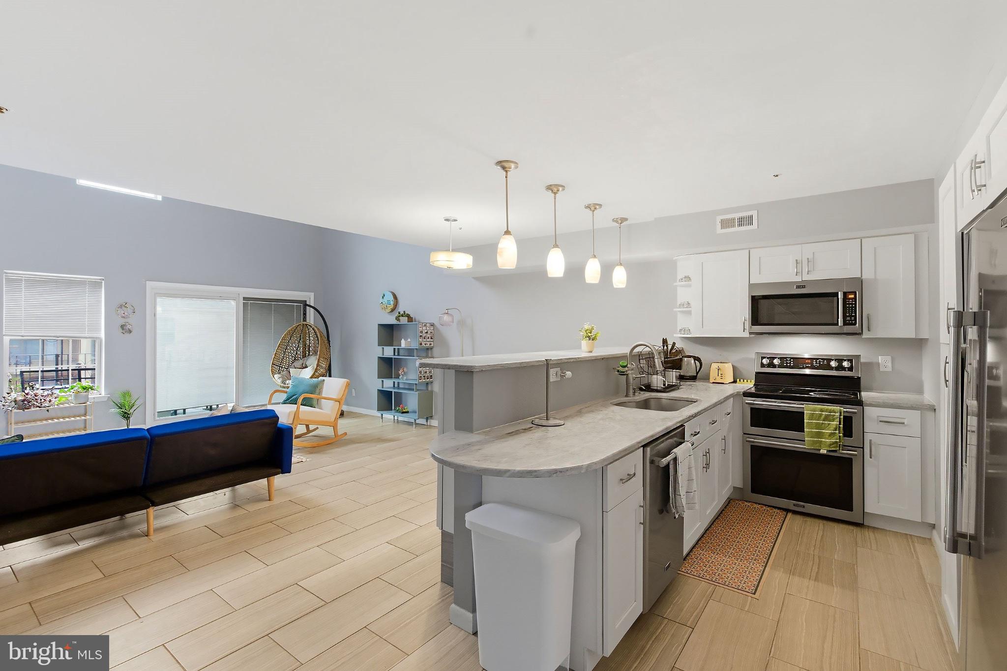 3036 Main Street, Unit 3036 Voorhees, NJ 08043 - Photo 5 of 24 Bright and airy modern kitchen space.