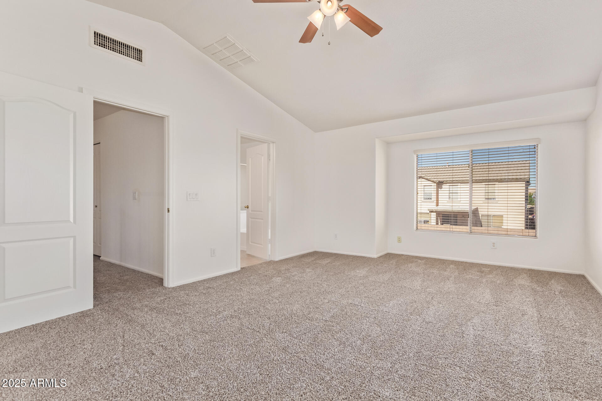2432 West Blue Sky Drive Phoenix, AZ 85085 - Photo 23 of 40 a view of an empty room with a window