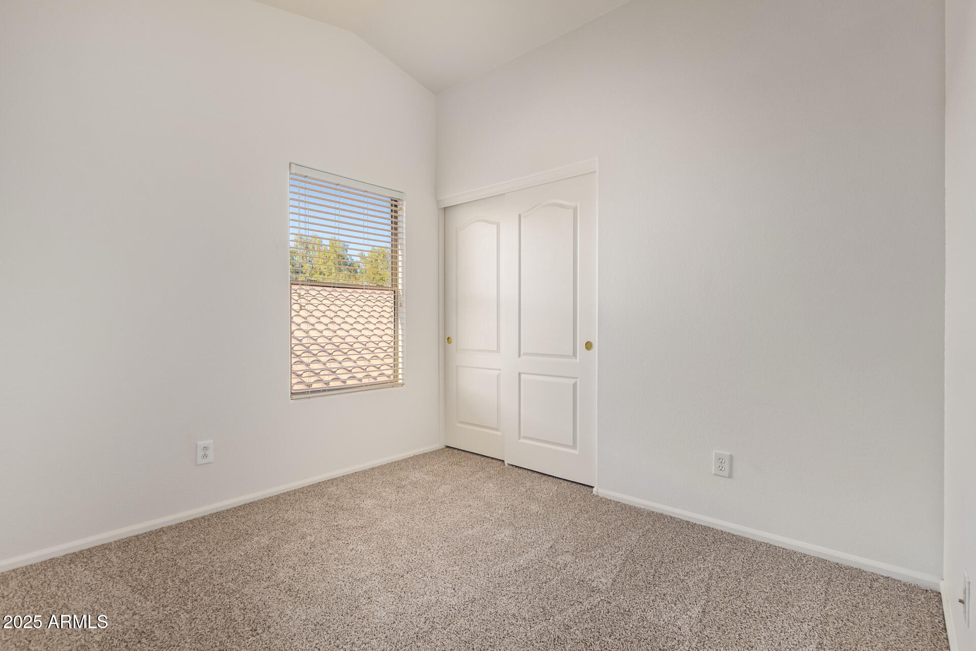 2432 West Blue Sky Drive Phoenix, AZ 85085 - Photo 29 of 40 a view of an empty room with a window