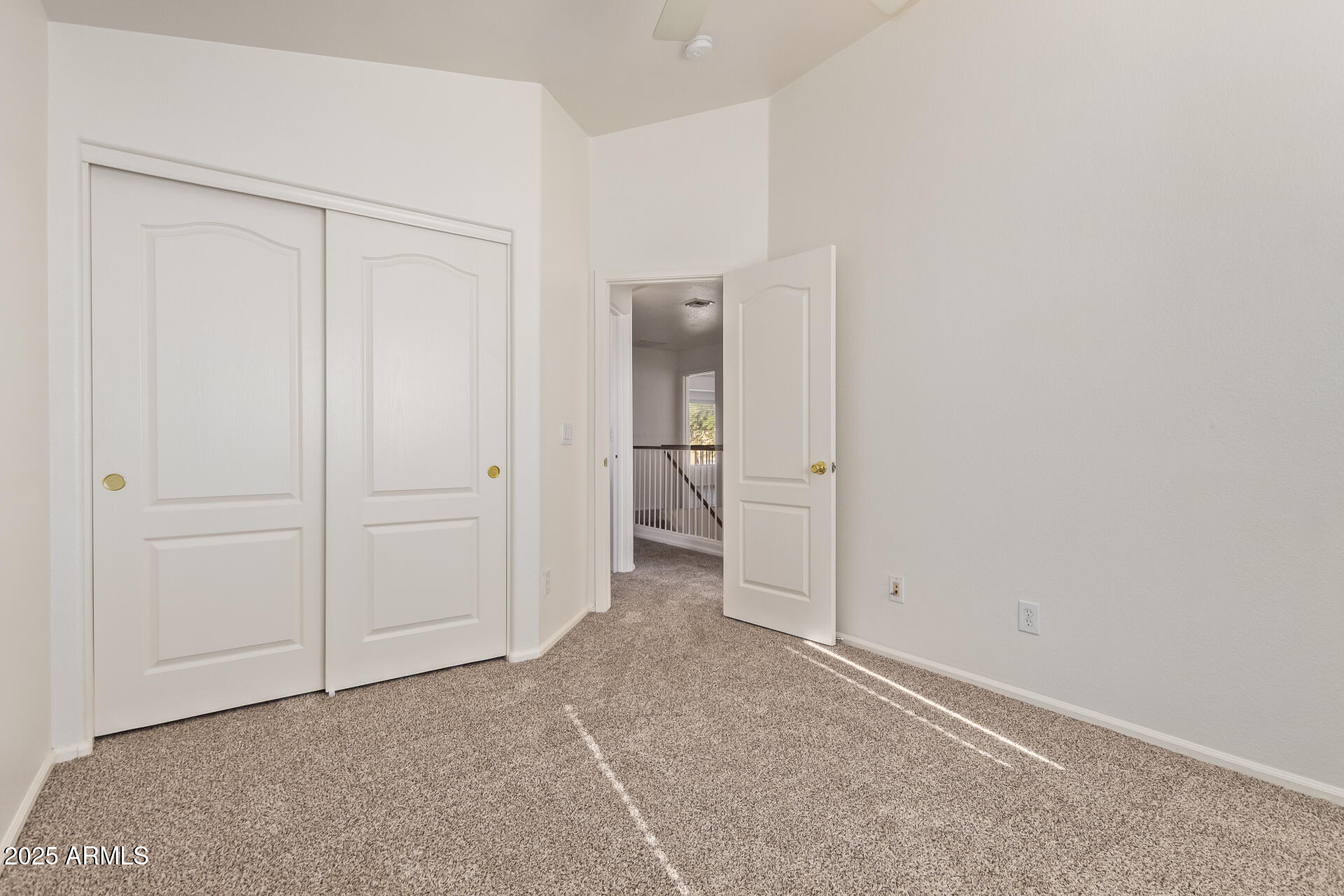 2432 West Blue Sky Drive Phoenix, AZ 85085 - Photo 33 of 40 an empty room with a bathroom