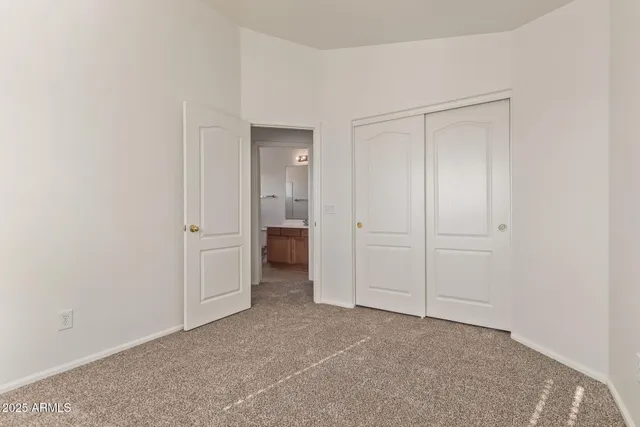 a view of a room with a wardrobe space