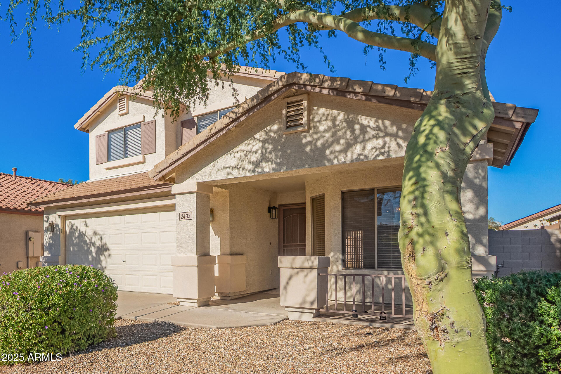 2432 West Blue Sky Drive Phoenix, AZ 85085 - Photo 6 of 40 a front view of a house
