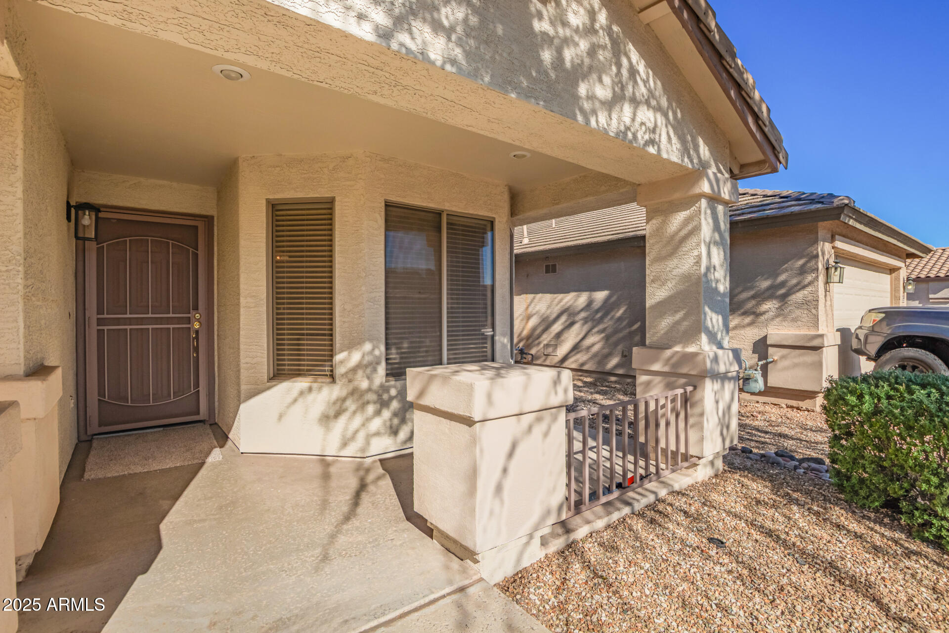 2432 West Blue Sky Drive Phoenix, AZ 85085 - Photo 7 of 40 a view of a patio with table and chairs and potted plants