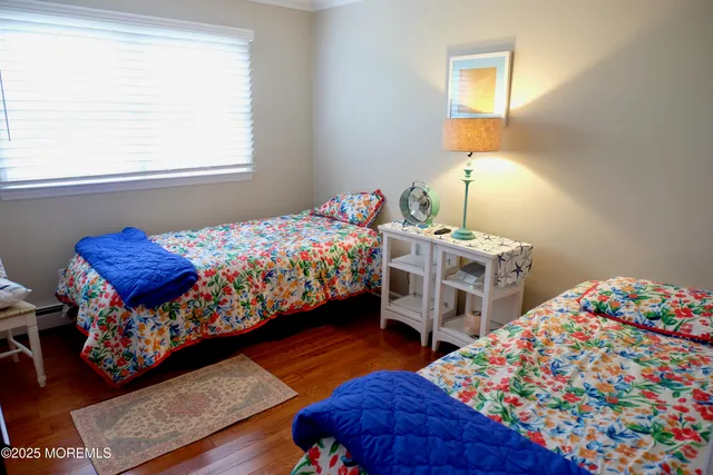 a bedroom with bed and a window