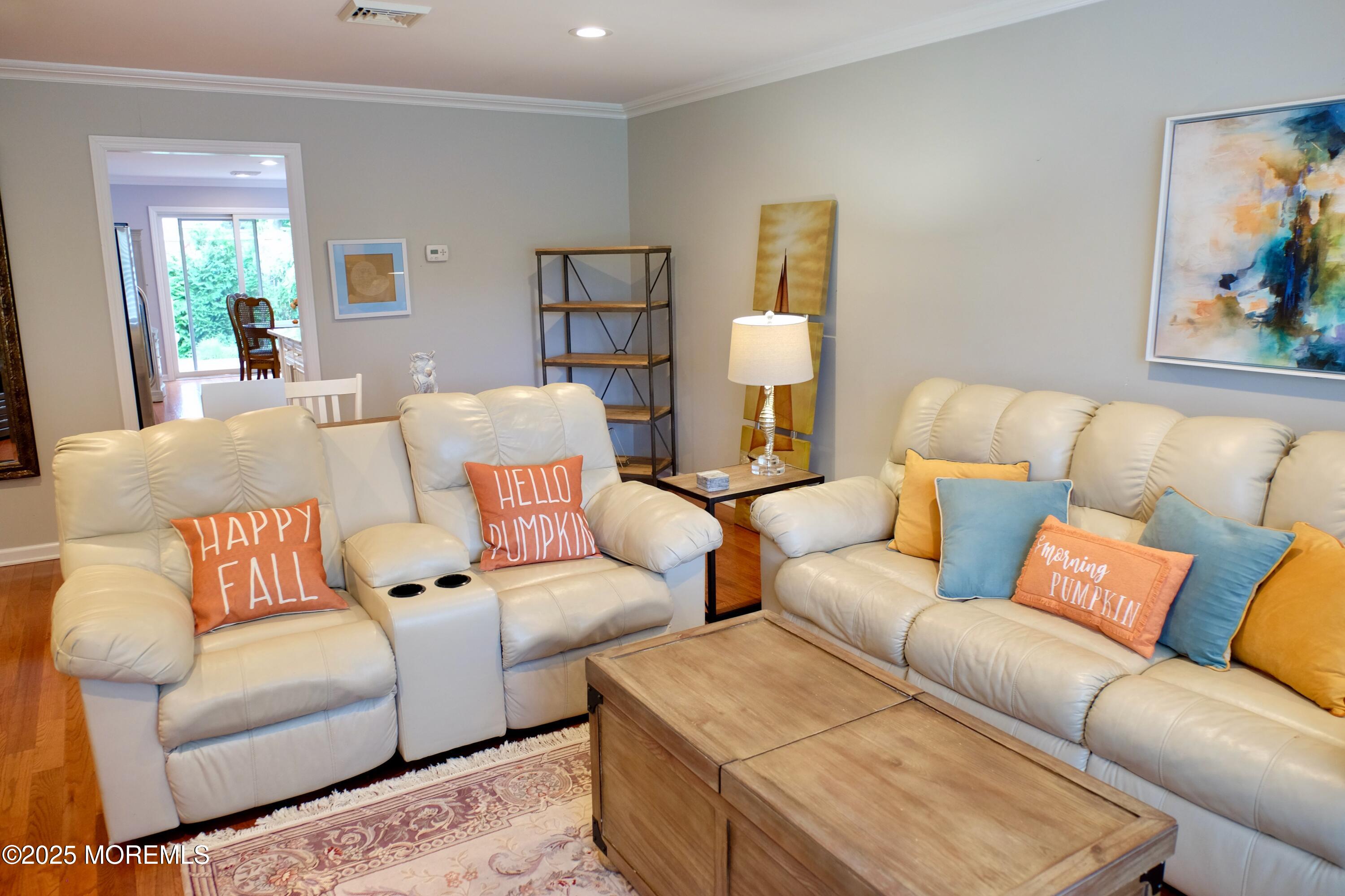 539 Woodland Avenue Brielle, NJ 08730 - Photo 6 of 19 a living room with furniture and a couch