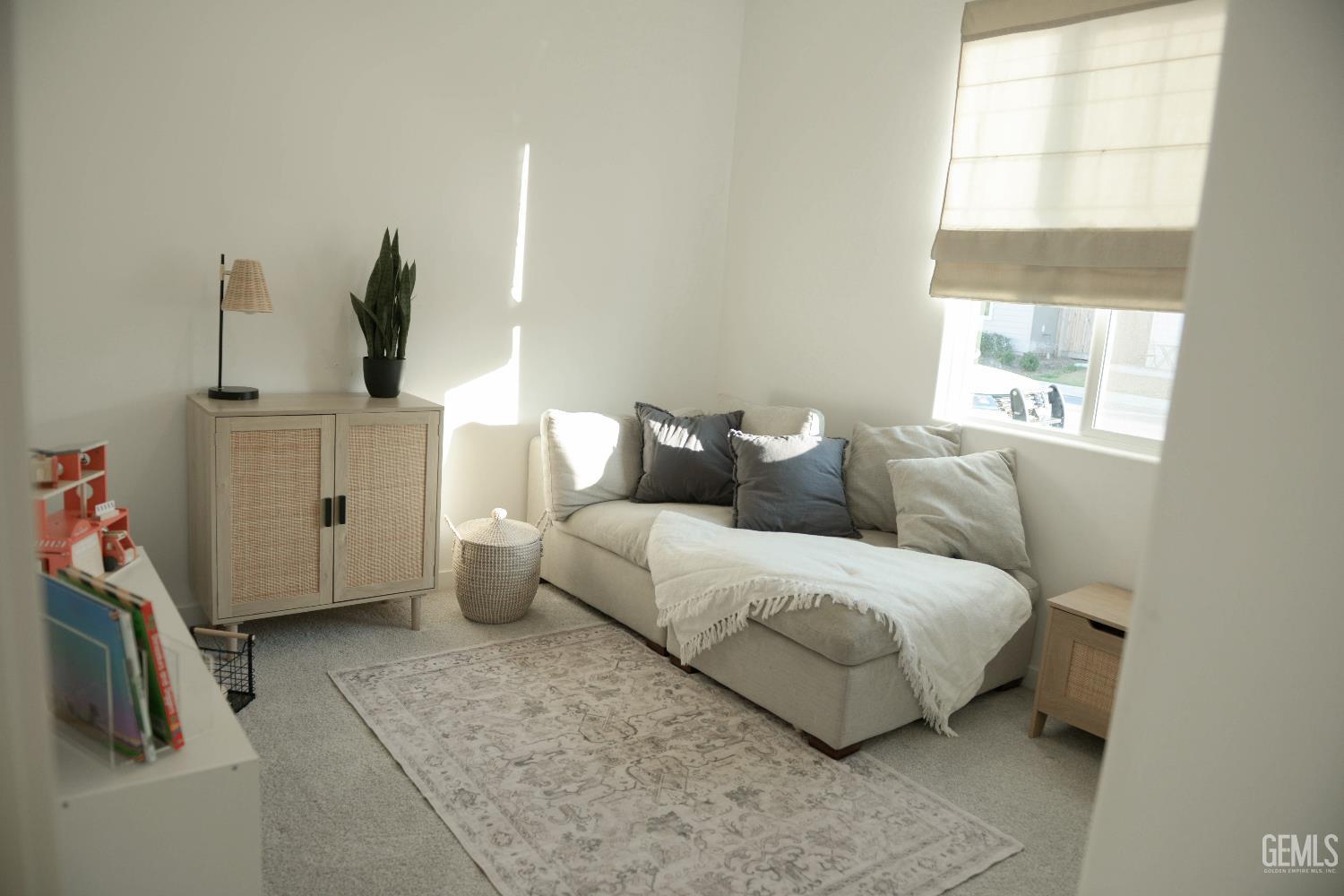 Undisclosed Address Shafter, CA 93263 - Photo 16 of 23 a bedroom with a bed and a window