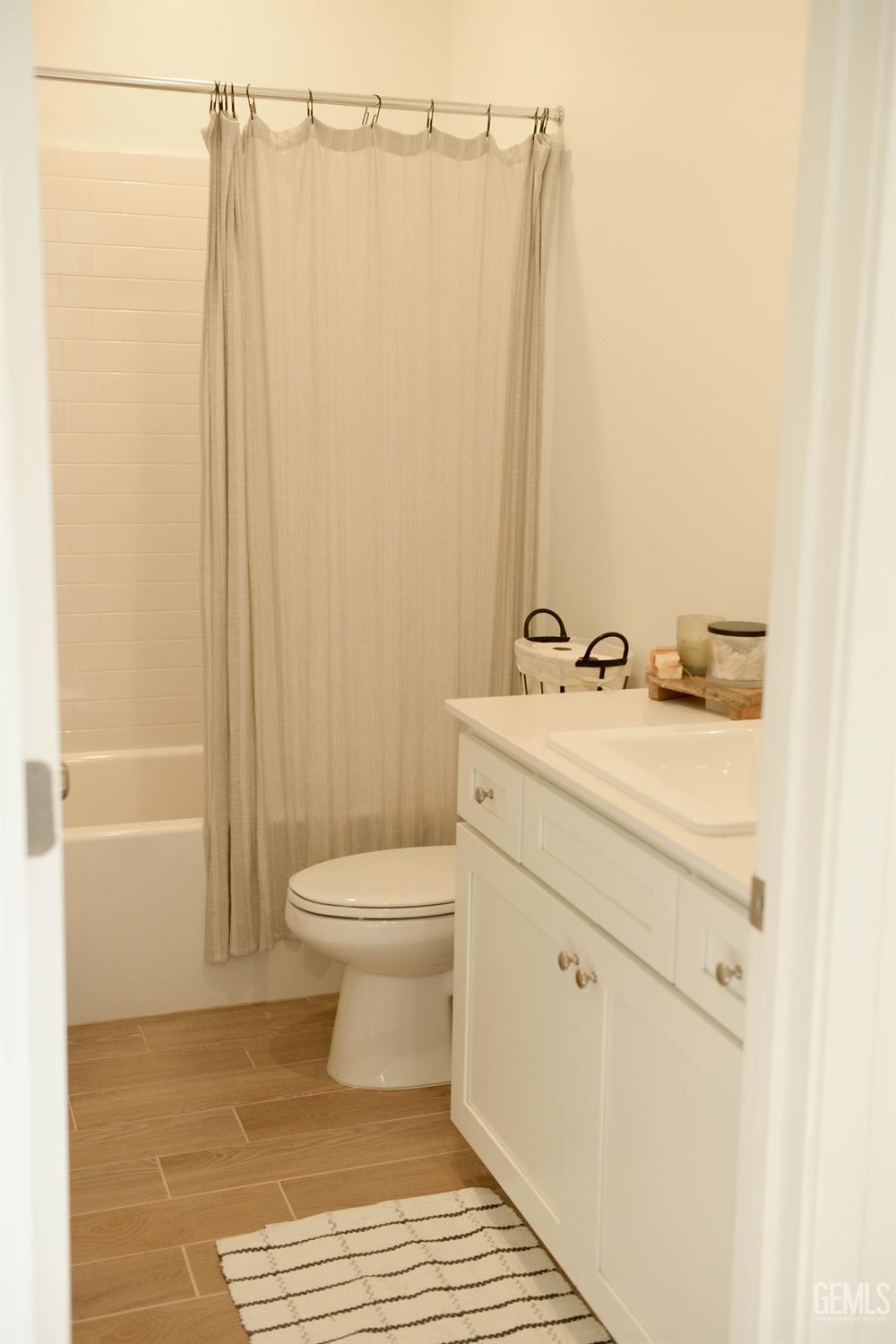 Undisclosed Address Shafter, CA 93263 - Photo 17 of 23 a bathroom with a sink a toilet and shower