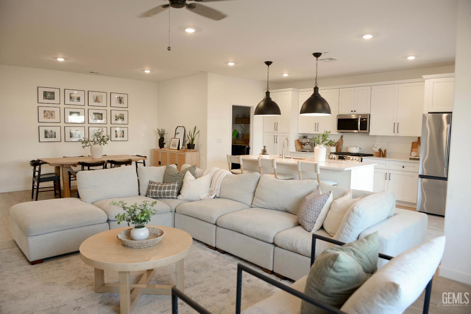 Undisclosed Address Shafter, CA 93263 - Photo 6 of 23 a living room with furniture kitchen and a table